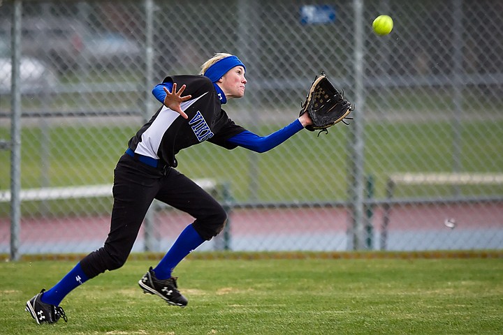 &lt;p&gt;Coeur d'Alene's Hailey Petit puts her glove out to catch a fly ball to center field in sixth inning during during a home game against Lakeland High School on Wednesday.&lt;/p&gt;