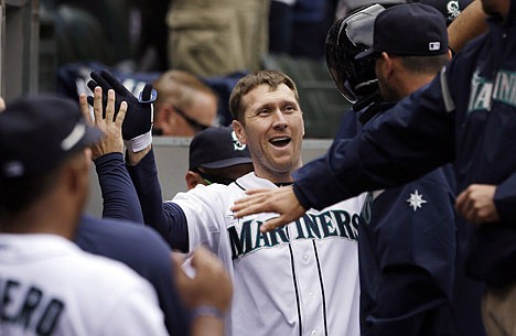 &lt;p&gt;Seattle's Jason Bay is congratulated after the former North Idaho College and Gonzaga standout tied the game at 1 with a home run in the seventh inning against the Los Angeles Angels on Sunday in Seattle.&lt;/p&gt;