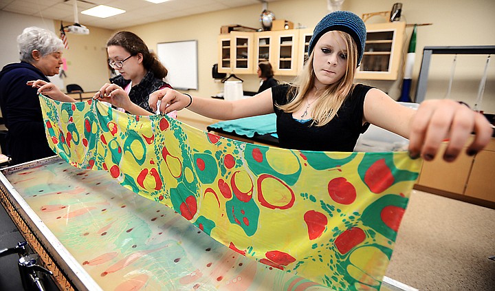 &lt;p&gt;Glacier students Shianne Getty, right, a freshman, and junior Brinlee Hager pull newly painted silk scarf from the vat of dyes in the Montana Art Institute Silk Marbling workshop on Saturday, April 26, at Glacier High School More than 200 students from around the state took part in classes at Glacier and at Flathead Valley Community College over the weekend. (Brenda Ahearn/Daily Inter Lake)&lt;/p&gt;