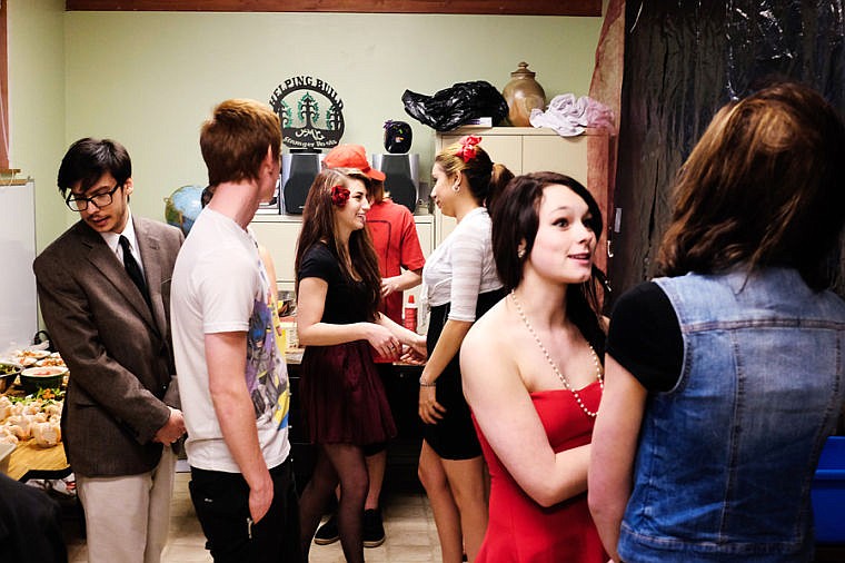 &lt;p&gt;Students chat in the back room while waiting for the dinner to start Friday night during Whitefish Independent High School formal inner. April 18, 2014 in Whitefish, Montana. (Patrick Cote/Daily Inter Lake)&lt;/p&gt;