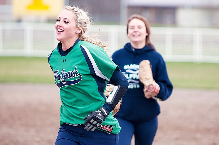 &lt;p&gt;Glacier senior Hannah Atlee (left) smiles as she runs in after making the last out of the game Thursday afternoon during Glacier's win in the first game of a doubleheader against Flathead at Conrad Complex. April 24, 2014 in Kalispell, Montana. (Patrick Cote/Daily Inter Lake)&lt;/p&gt;