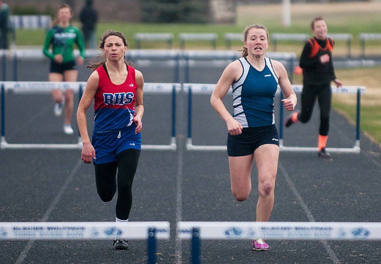 &lt;p&gt;Glaicer's Hailee Bennett (right) runs against Bigfork's Matti McAnally in the 300-meter hurdle race Tuesday afternoon during a track meet at Glacier High School. April 22, 2014 in Kalispell, Montana. (Patrick Cote/Daily Inter Lake)&lt;/p&gt;