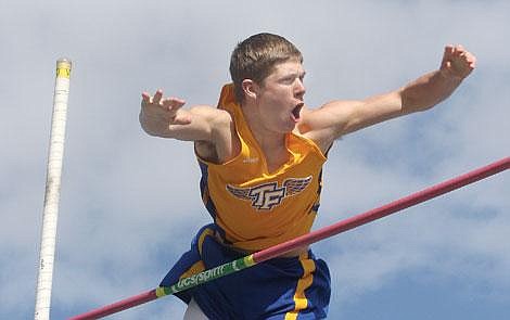 Photos by Aaric Bryan Bluehawk senior Brian Schenavar celebrates as he passes over the bar at 14 feet, 6 inches in the pole vault to set a Thompson Falls record at the 10th annual Russ Pilcher Western Montana Top 10 track meet in Missoula last Tuesday. Schenavar&#146;s leap was the best Class B pole vault so far this season. The senior hopes to clear 15 feet this year.