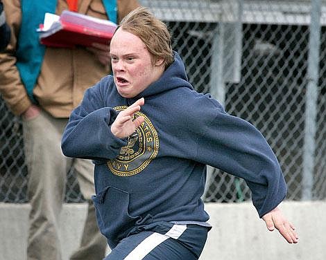 Photos by Ed Moreth Noxon Cowboy Josiah Smith pours on the speed to take first place in the 100-meter dash at the 2008 Glacier Area Summer Games at Kalispell.