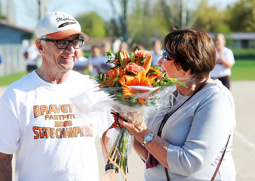 &lt;p&gt;&lt;strong&gt;Flathead athletics&lt;/strong&gt; legend Gene Boyle and his wife, Barb, smile during a dedication ceremony at the Conrad Complex before the Flathead Bravettes softball game on Tuesday. Wherever the Bravettes play home games now will be called Barb and Gene Boyle Field. Gene Boyle spent 45 years in education ranging from activities director at Flathead High School to principal at St. Matthew&#146;s School. He worked with students from kindergarten through 12th grade, coached champions in football, basketball, track, baseball and softball, and organized nearly every kind of school event under the sun. He coached the Bravettes to their only state softball championship in 2003. (Aaric Bryan/Daily Inter Lake)&lt;/p&gt;