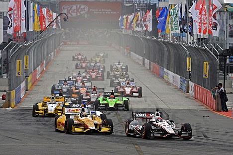 &lt;p&gt;Winner Will Power (12) and second-place finisher Ryan Hunter-Reay (28) lead into the first turn after a restart during the IndyCar Series Sao Paulo 300 on Sunday in Sao Paulo, Brazil.&lt;/p&gt;