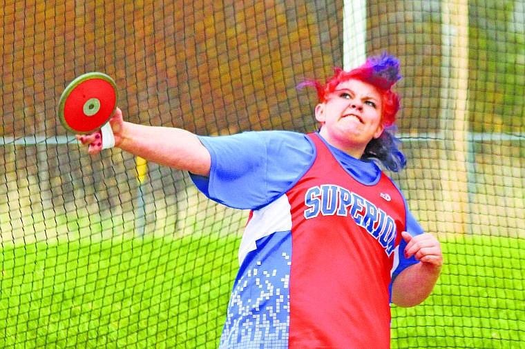 <p>Emily Riddle throws discus for Superior at the Arlee Invitational. </p>