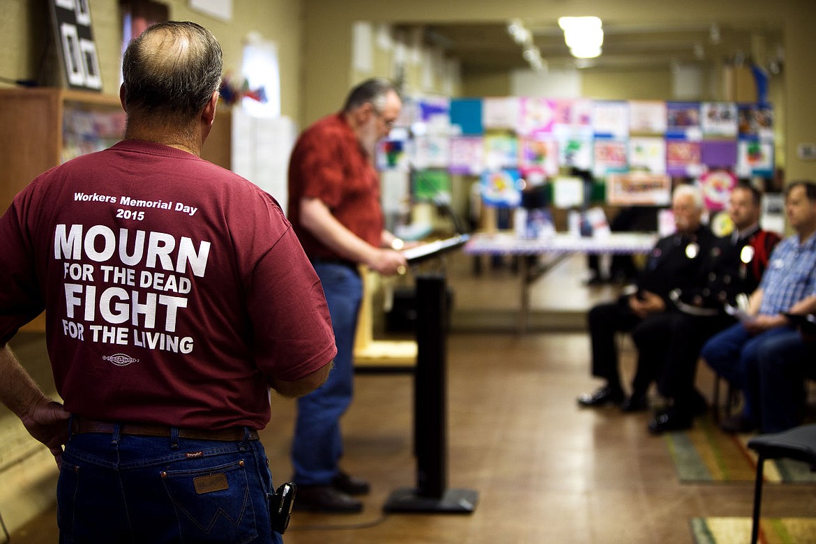 &lt;p&gt;Wearing a Workers Memorial Day 2015 T-shirt, Brad Cederblom listens to Larry Kenck speak at the Human Rights Education Institute Tuesday. The Worker&#146;s Memorial Ceremony honored 19 Idaho workers killed on the job this past year.&lt;/p&gt;