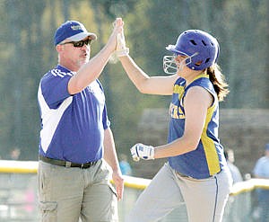 &lt;p&gt;Devon Gallagher sends one out of the park on the 1-0 pitch scoring herself and Abby Ennenga bottom of third inning. Sets the score at 3-1 Libby over Flathead. Ball hit the outfield fence and bounced into Fire Chief Tom Wood's truck. High five with Coach Dean Thompson as she rounds third.&lt;/p&gt;