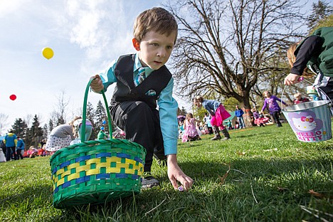 &lt;p&gt;GABE GREEN/Press&lt;/p&gt;&lt;p&gt;Sharply dressed seven-year-old Beniah Welke picks up a chocolate egg with an eye on his next prize on the lawn of Phippeny Park in Coeur d&#146;Alene during Real Life Ministries&#146; Easter egg hunt Saturday morning.&lt;/p&gt;