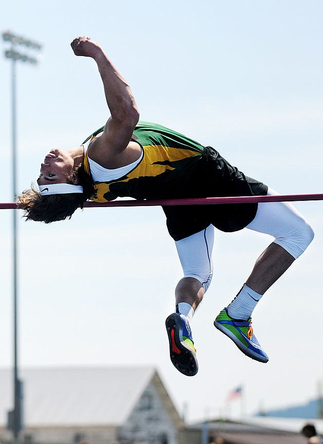 <p>Whitefishs Jed Nagler attempts to set a school record in the high jump by clearing 6 feet, 8 1/2 inches at the Archie Roe Invitational track meet on Saturday. Nagler missed the record, but won the event by making 6-5. (Aaric Bryan/Daily Inter Lake)</p>