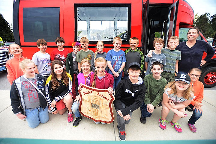 &lt;p&gt;Lorrie Gomez, right, and her fourth grade class prepare to board two of the new red buses for ride to Glacier National Park on Friday morning, April 29, at Lakeside Elementary. This tour was a reward for a project based on the idea of appreciating Glacier and it&#146;s natural features like being cold, complex, connected and clean. The contest was open to all fourth graders in Flathead County. It was also the kickoff to Xanterra&#146;s Junior Jammer program which they are launching this year.&lt;/p&gt;