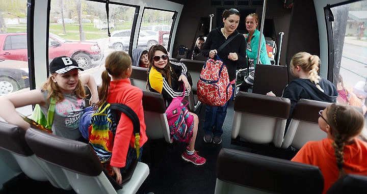 &lt;p&gt;Students load onto a red bus as they prepare of head into Glacier National Park on Friday morning, April 29, at Lakeside Elementary.&lt;/p&gt;