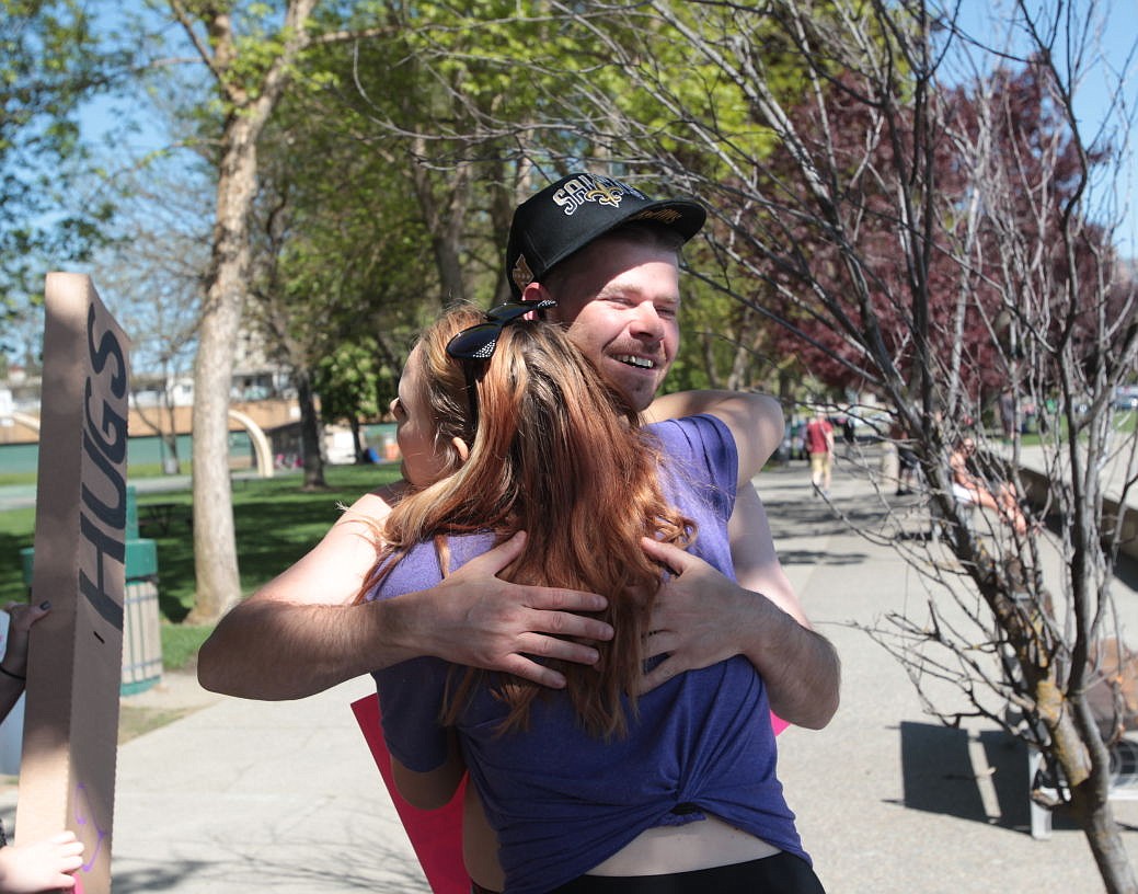 &lt;p&gt;North Idaho College student Nicole Hill receives a hug from Jarrett Smith of Spokane on Sunday.&lt;/p&gt;