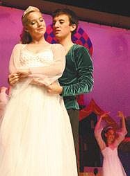 Aaron Ornelas (Prince Ivan) and Lacey Swanson (Princess Vasilissa) embrace in a scene from the "The Firebird" Ballet performed Saturday by the Ballet Academy of Moses Lake. In the ballet, Ornelas' character falls in love with Princess Vasilissa and decides to try and free her and the other princesses held captive by the evil character Kostchei played by Catherine Polito. This was BAML director, Robyn Wenrich's last performance in Moses Lake before she will be moving to Indiania with her family. <br>Aimee Hornberger/Columbia Basin Herald