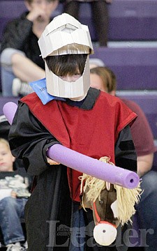 &lt;p&gt;Izaiah Gray heads into a jousting match during the medieval fair last Friday at Linderman Elementary School.&lt;/p&gt;