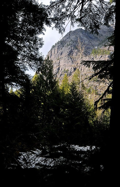 Views of massive mountains can be seen along the 4-mile roundtrip hike to Avalanche Lake.