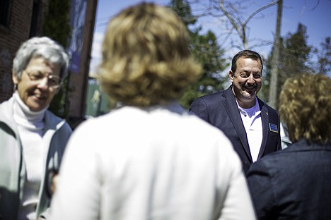 &lt;p&gt;Thomas Carter, executive director for Human Rights Education Institute, mingles with guests prior to the Choose Love Over Fear Day proclamation.&lt;/p&gt;