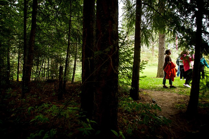 &lt;p&gt;JEROME A. POLLOS/Press Sage Joyce stands at the entrance of a trail leading into the woods near Q'emiln Park while learning about the trees and animals of the area.&lt;/p&gt;