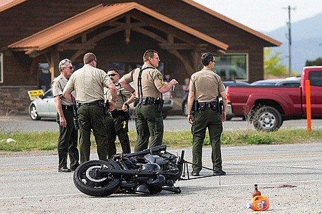 &lt;p&gt;Kootenai County and Spokane County sheriff&#146;s deputies discuss details of the accident near a motorcycle that was struck by an SUV.&lt;/p&gt;