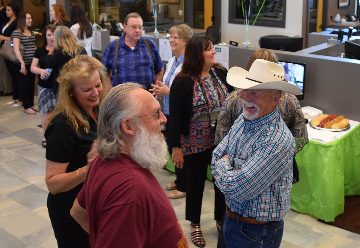 Local dignitaries and stakeholders milled about inside Granco Federal Credit Union&#146;s newly constructed branch in Moses Lake Monday morning before and after the institution&#146;s grand opening ceremony.