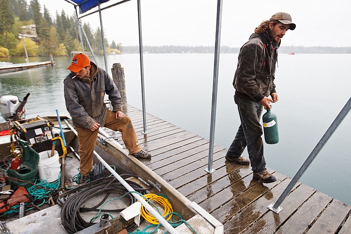 &lt;p&gt;SHAWN GUST/Press Kevin Almeida, right and Travis Mitchell, both workers for Harrison Dock Builders, work on dock improvements Thursday on Hayden Lake. The pair are credited with saving two men who crash landed a single engine airplane on the lake about an hour earlier.&lt;/p&gt;