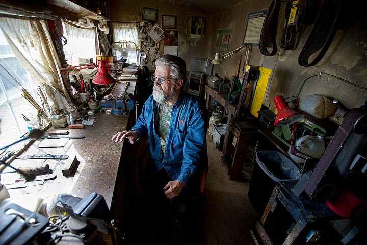 &lt;p&gt;Mike Mann, 71, sits in his knife-making workshop on Monday, April 11, 2016 that is situated on his home property on Hoodoo Mountain.&lt;/p&gt;