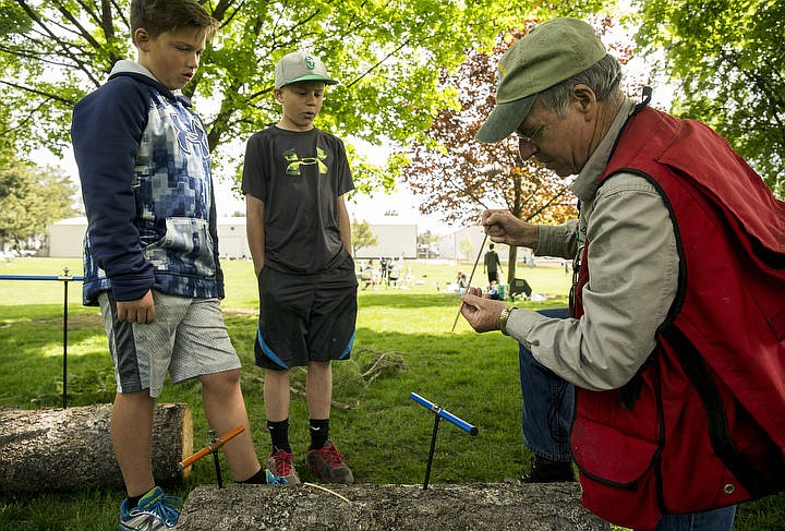 &lt;p&gt;LOREN BENOIT/Press Senior Forester Dennis Parent, right, of DRPforestry, shows Hayden Meadows Elementary students Cooper Prehaska, left, and Will Kladar, middle, a core sample of a tree during The City of Hayden's Arbor Day event held Thursday, April 28, 2016 at McIntire Park.&lt;/p&gt;