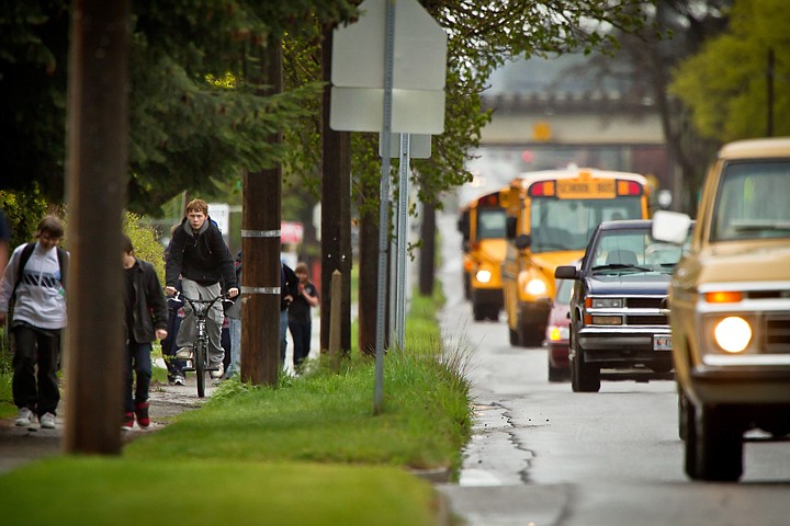 &lt;p&gt;Kyle Hinson, 12, navigates his way between his classmates walking from Lakes Magnet Middle School along 15th Street after school Thursday. The City of Coeur d'Alene is considering adding bicycles lanes between Sherman Avenue on Interstate 90 on 15th Street.&lt;/p&gt;