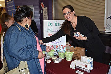 &lt;p&gt;&lt;strong&gt;Dentist Amber Dailey chats with visitors at the Mission Valley Trades Fair and Business Expo Saturday.&lt;/strong&gt;&lt;/p&gt;&lt;p&gt;&lt;strong&gt;&#160;&lt;/strong&gt;&lt;/p&gt;