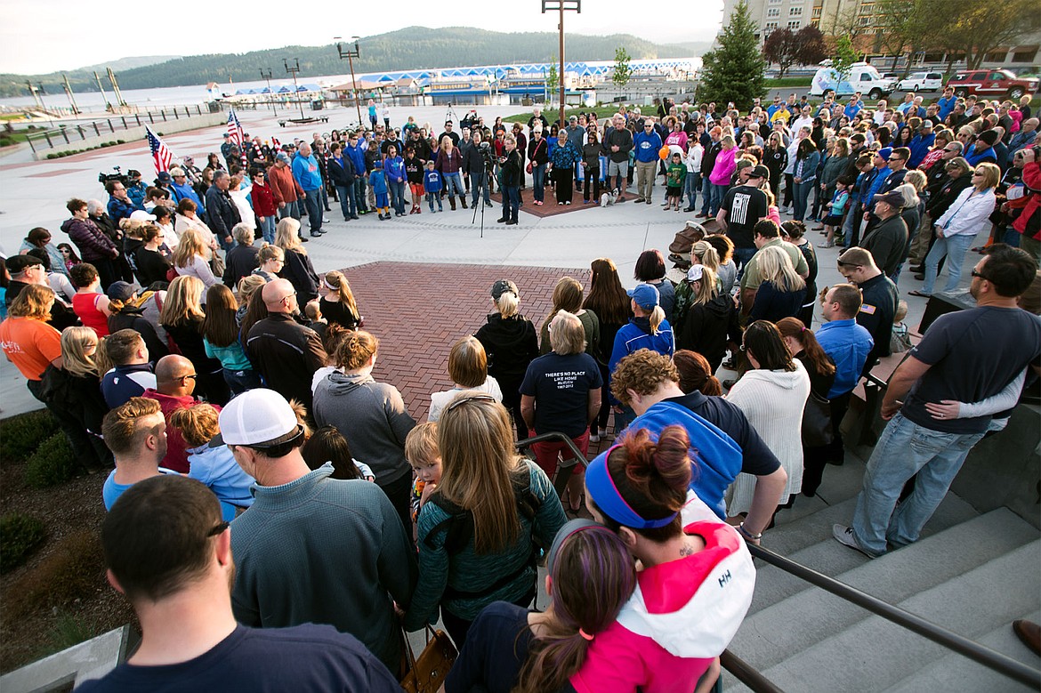 &lt;p&gt;Following a march around McEuen Park to honor Sgt. Greg Moore, hundreds gather on May 6, 2015 for a prayer led by Coeur d&#146;Alene resident Scott Maclay.&lt;/p&gt;