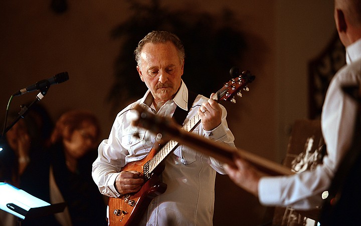 &lt;p&gt;Glacier Symphony and Chorale's Music Director, John Zoltek plays the electric guitar with bass player Ron Reeves and percussionist Don Caverly on Friday evening, April 25, at Jazz Night with the Maestro at the Alpine Ballroom in Kalispell. The sold out show was the final installment of the &quot;Symphony Soloist Spotlight,&quot; series. (Brenda Ahearn/Daily Inter Lake)&lt;/p&gt;