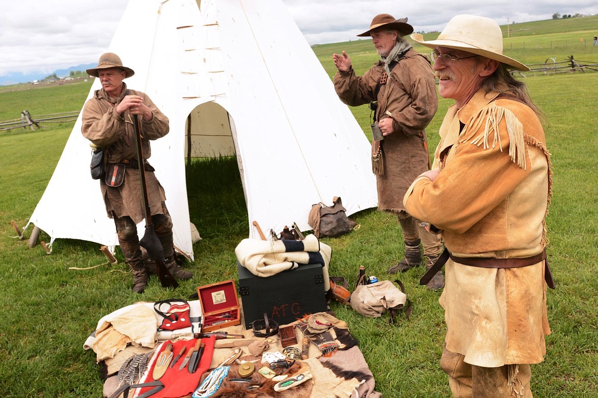 &lt;p&gt;Elliott Natz/Lake County Leader From left:Ross Baty, Marvin Sowers and Kim Koenig stand by their display, talking about hunting and camping while using their pioneer-era gear and tools. Koenig has come to the event for four years while Sowers and Baty are coming to the Rendezvous for thier first year. Sowers and Koenig have made collecting and using the early-era gear their hobbies for many years, both of them starting in their teens while Baty is new to the scene.&lt;/p&gt;