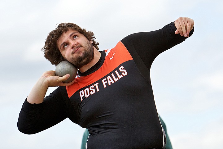 &lt;p&gt;Post Falls High's Matt Wardell spins as he prepares launch a shot to a distance of 57 feet at the District 1 all-star track and field meet Thursday in Post Falls.&lt;/p&gt;