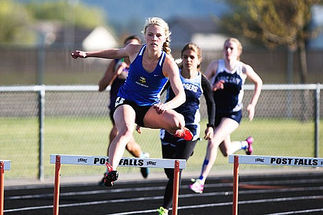 &lt;p&gt;KRISTEN McPEEK/Press Kaitlyn Gunnerson of Coeur d&#146;Alene competes in the 300 meter intermediate hurdle event at the District 1 all-star meet Thursday, April 30th at Post Falls High School.&lt;/p&gt;