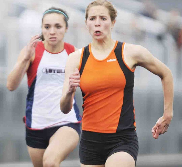 &lt;p&gt;Flathead&#146;s Tess Brenneman eyes the finish line in the 100-meter dash Saturday during the Archie Roe Invitational track meet at Legends Stadium.&lt;/p&gt;&lt;p&gt;&lt;/p&gt;