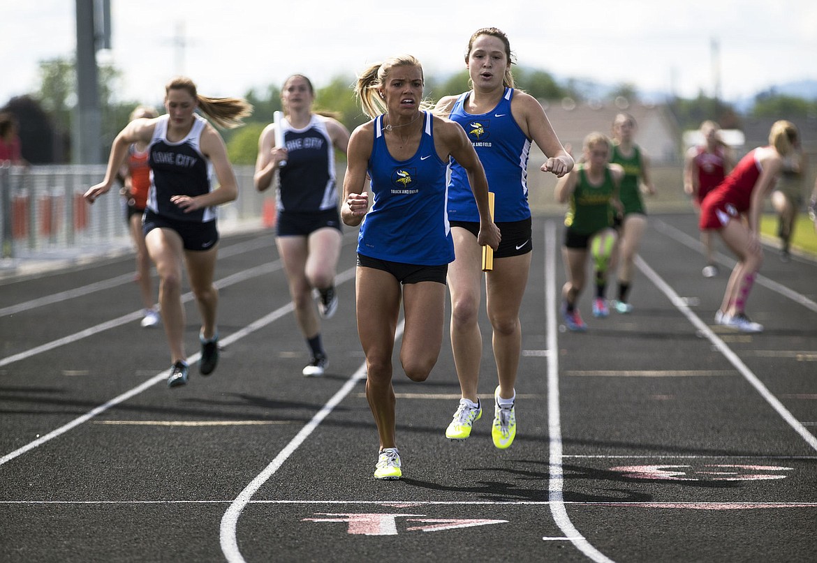 &lt;p&gt;LOREN BENOIT/Press Coeur d&#146;Alene High senior Emily Callahan, middle, receives the baton from Taryn Horvath during Thursday&#146;s District 1 All-Star meet. The Coeur d&#146;Alene girls won the 4x200 relay in 1:44.42, with Callahan in the anchor leg.&lt;/p&gt;