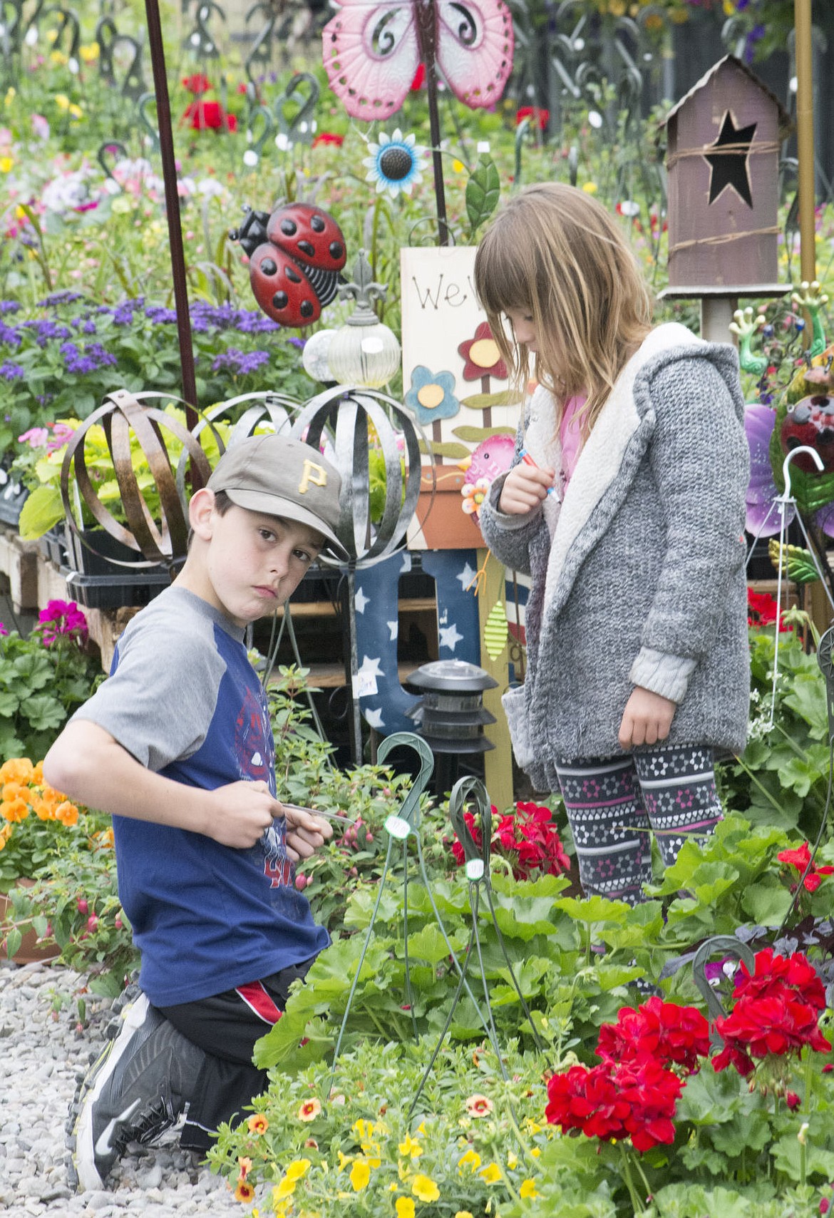 &lt;p&gt;Hunter and Ellianna O'Brien play with tags after the delivery.&lt;/p&gt;