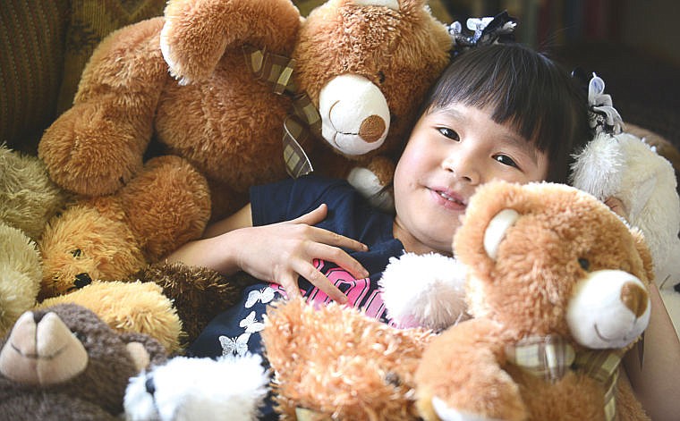 &lt;p&gt;Emma Anderson is surrounded by teddy bears at her home in Kalispell.&lt;/p&gt;