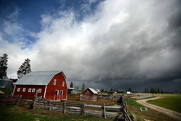 &lt;p&gt;A red barn shines in a patch of sunlight as storm clouds pour into the valley on Monday morning, April 29, north of Kalispell. (Brenda Ahearn/Daily Inter Lake)&lt;/p&gt;