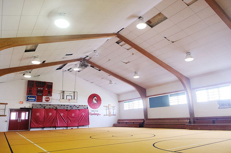 &lt;p&gt;Several ceiling tiles are missing from the Somers School gym, which has carpet flooring. The Somers-Lakeside School District is asking voters to approve a $200,000 tax levy to cover reduced revenue and facility needs such as roof work.&lt;/p&gt;