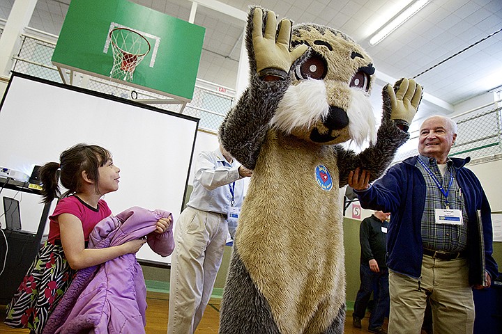 &lt;p&gt;JEROME A. POLLOS/Press Olivia Caballero-Zarate, a kindergarten student at the Hayden Kinder Center, walks up to Josh the Baby Otter as he waves goodbye to students Friday while being escorted by Rand Ginn a rotarian from Mercer Island. Rotarians organized the visit to help educate students on water safety. During the visit to area schools, students were read the book &quot;Josh the Baby Otter&quot; and reminded of the importance of never swimming alone and how to be safe around water.&lt;/p&gt;