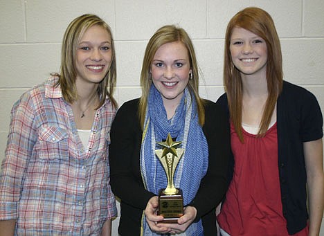 &lt;p&gt;Lake City's first Maestro Award for choral music was earned by this choir trio, from left, Carly Farrell, Cassidy Ball and Jansen Butler.&lt;/p&gt;