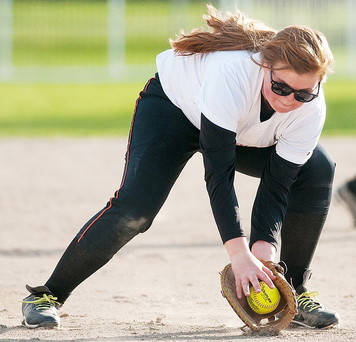 &lt;p&gt;Flathead senior Cassidy Smith fields a ground ball Tuesday afternoon during Flathead's matchup against Libby at Conrad Complex in Kalispell. May 6, 2014 in Kalispell, Montana. (Patrick Cote/Daily Inter Lake)&lt;/p&gt;