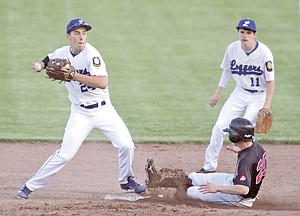 &lt;p&gt;Jared Winslow gets a forceout at second before turning two to Andrew Haggerty at first base against Calgary.&lt;/p&gt;