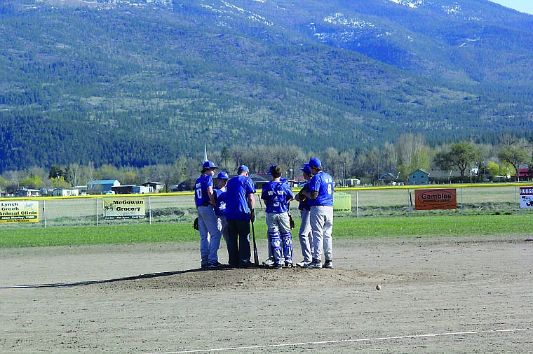 &lt;p&gt;The Plains Royals meet on the mound, shortly before the start of the game.&#160;&lt;/p&gt;