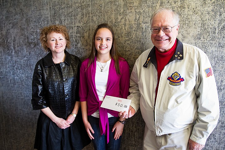 &lt;p&gt;Third place in the 2010 Patriotic Essay Contest, Emma McCormick, Charter Academy seventh-grader, receives a check in the amount of $50 from the Knights of Columbus' Graham Crutchfield. Also pictured, McCormick's English teacher, Lynda LeBlanc, left.&lt;/p&gt;