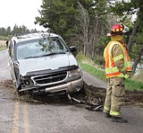 SUV goes in the river
