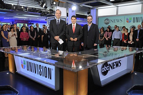 &lt;p&gt;In this image released by ABC, ABC News president Ben Sherwood , left, Univision Networks president Cesar Conde, center, and Univision News president Isaac Lee pose as they announce the joint venture between ABC News and Univision News, Monday, May 7, 2012 in New York. (AP Photo/ABC, Lorenzo Bevilaqua)&lt;/p&gt;