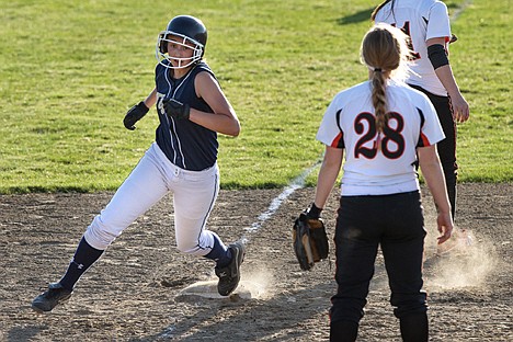 &lt;p&gt;Katie Malloy rounds third base on her way home during the fourth inning of Timberlake&#146;s 3A District 1 tournament game against Priest River Wednesday.&lt;/p&gt;